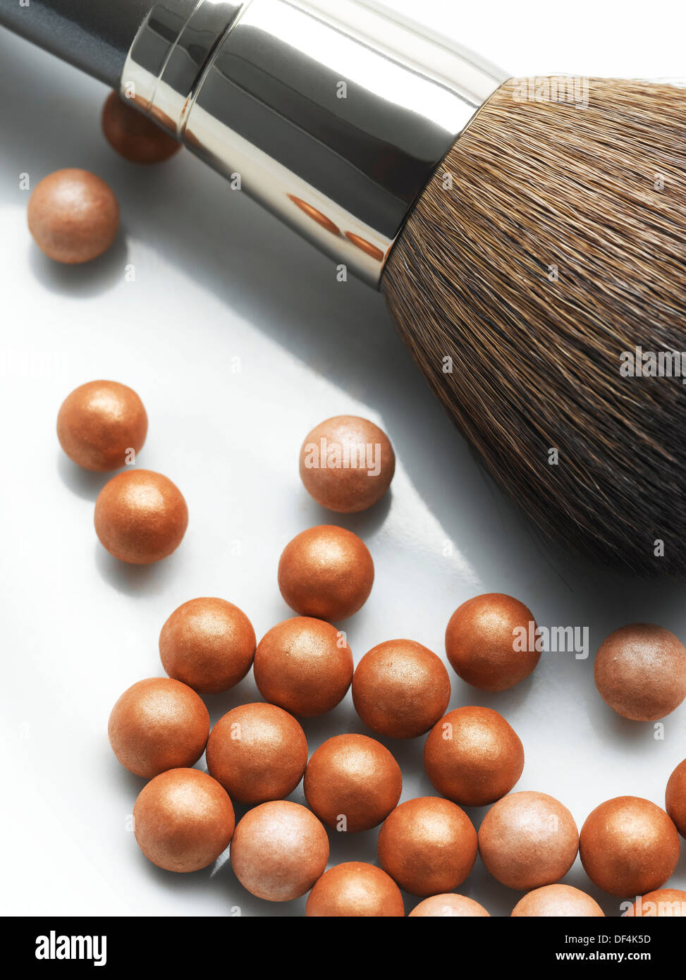 Makeup Brush With Bronzing and Blush Beads Stock Photo