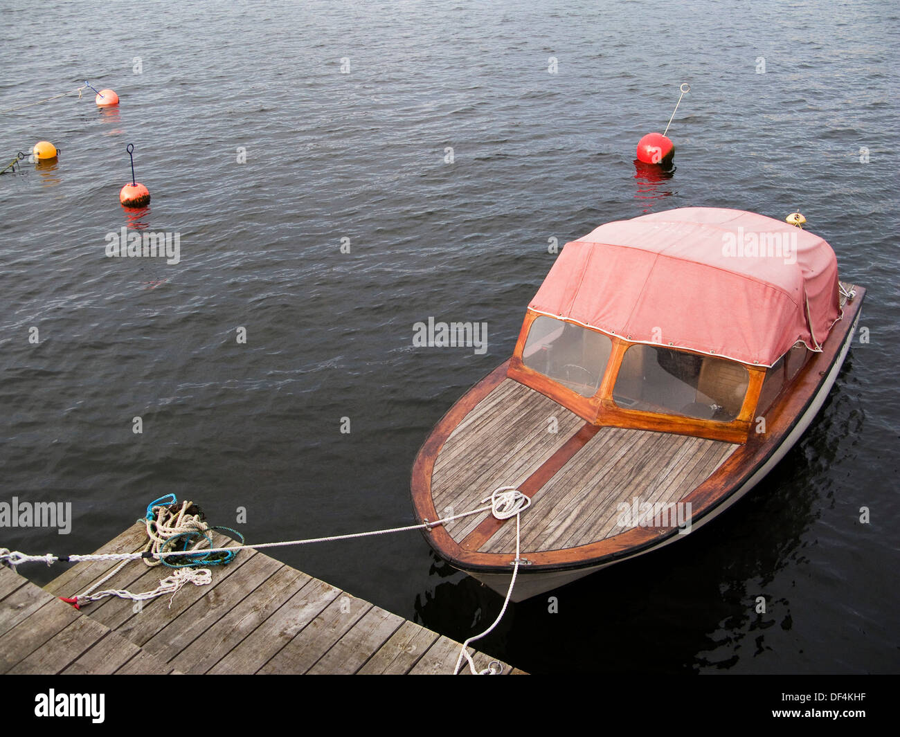 Small Motorboat Moored at Dock, High Angle View Stock Photo