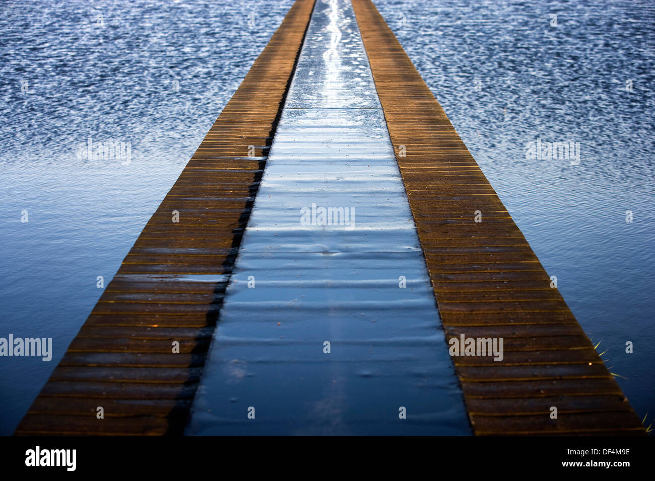 Wood Dock Extending Across Lake Stock Photo - Alamy