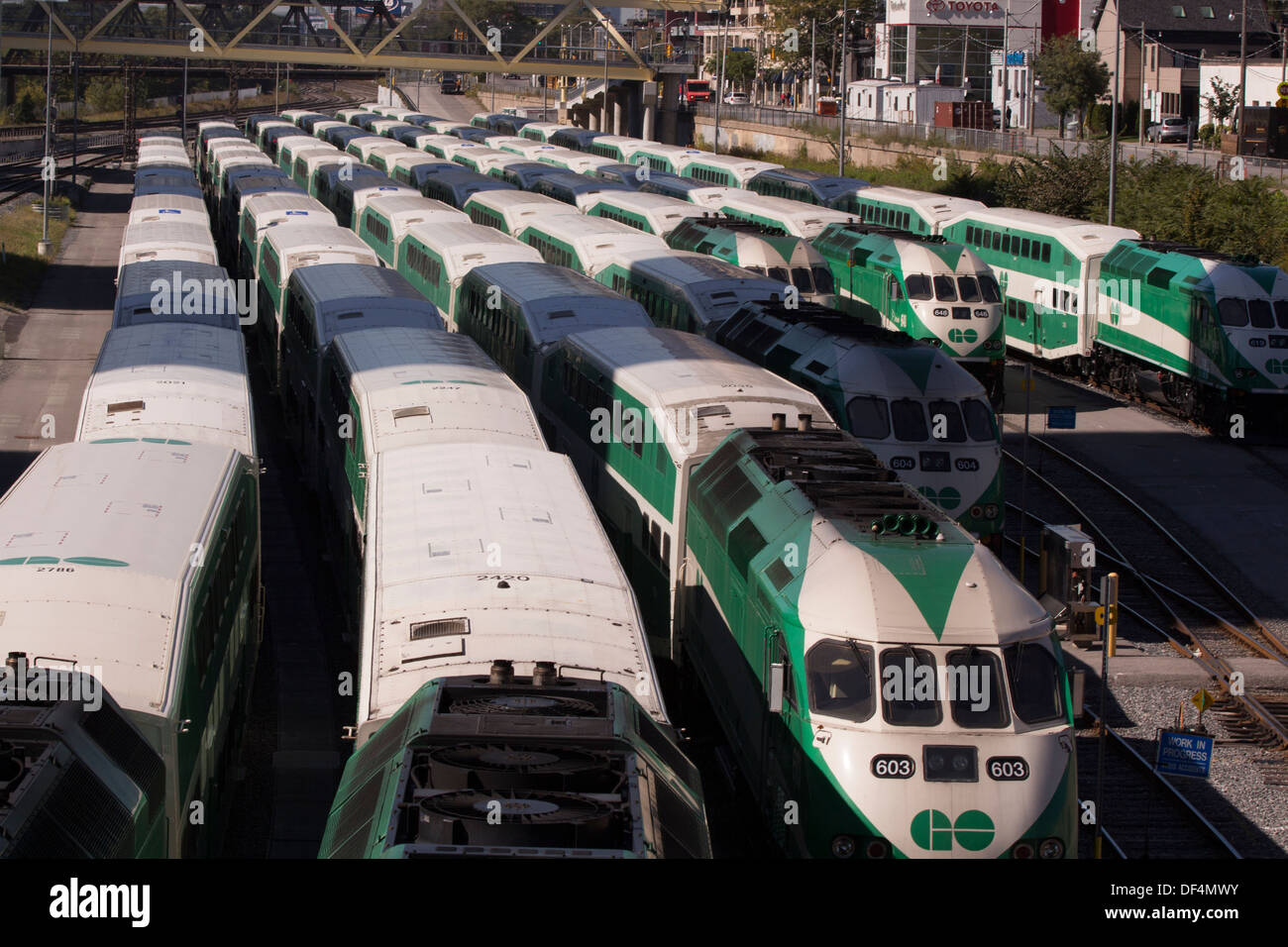 7 GO trains parked on tracks at Union Station Stock Photo