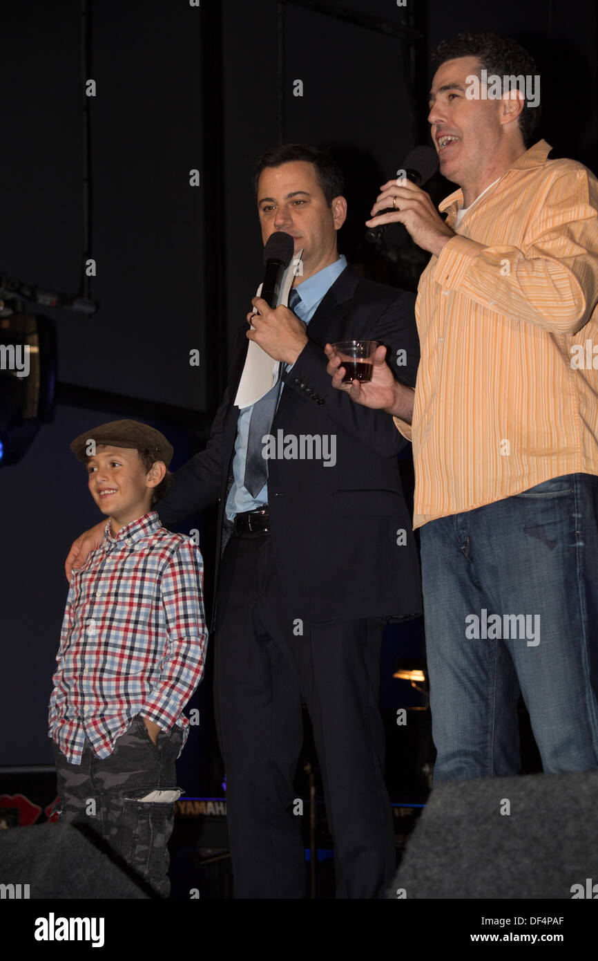 LA, CA, USA. 26th Sept, 2013. Comedian Adam Carolla and late night TV talk show host Jimmy Kimmel with Adam's son Santino (Sonny) at the Prima Notte Gala at the Feast of San Gennaro Italian Festival in Los Angeles, CA, USA on September 26, 2013 © Kayte Deioma/Alamy Live News Stock Photo