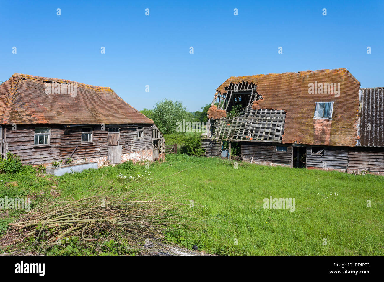 Old decrepit buildings in a rural English farmyard, Bucklebury, Berkshire, England, GB, UK. Stock Photo