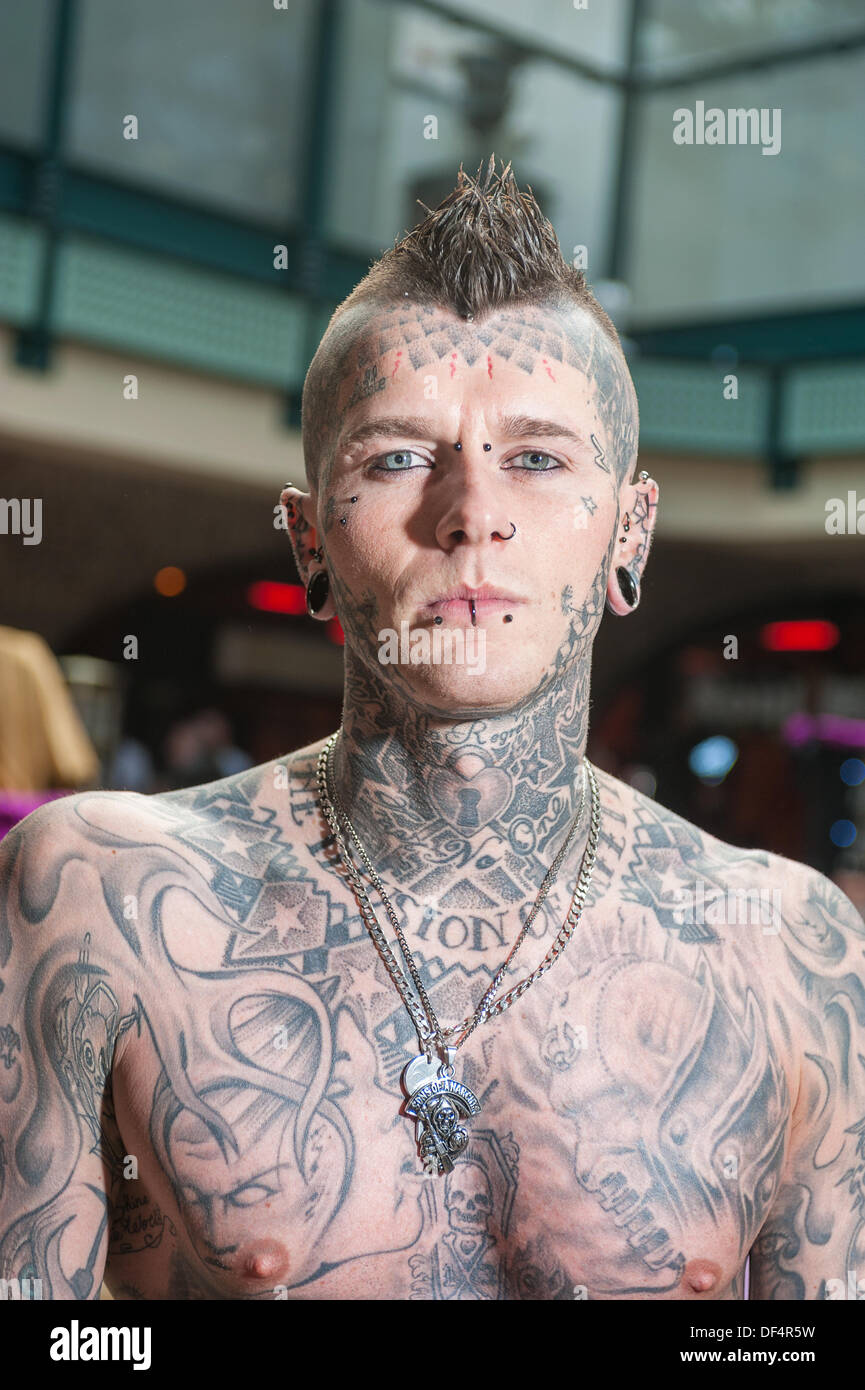 Wapping, London, UK. 27th Sept, 2013. Tattooist and piercer Baz Black at the Convention. Tattoo artists, enthusiasts and entertainers gathered from around the world for the three day event. © Terence Mendoza/Alamy Live News Stock Photo