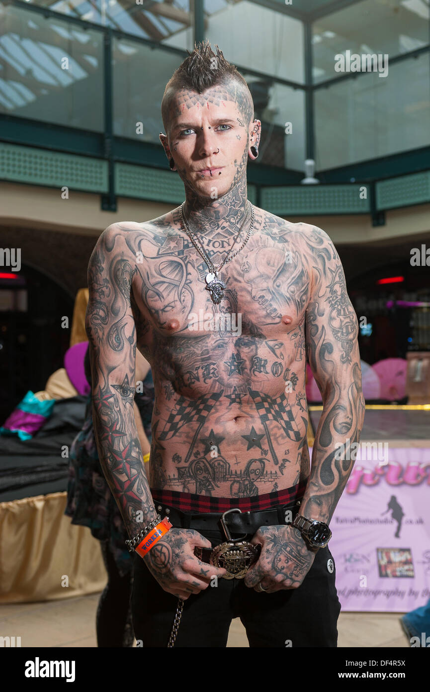 Wapping, London, UK. 27th Sept, 2013. Tattooist and piercer Baz Black at the Convention. Tattoo artists, enthusiasts and entertainers gathered from around the world for the three day event. © Terence Mendoza/Alamy Live News Stock Photo