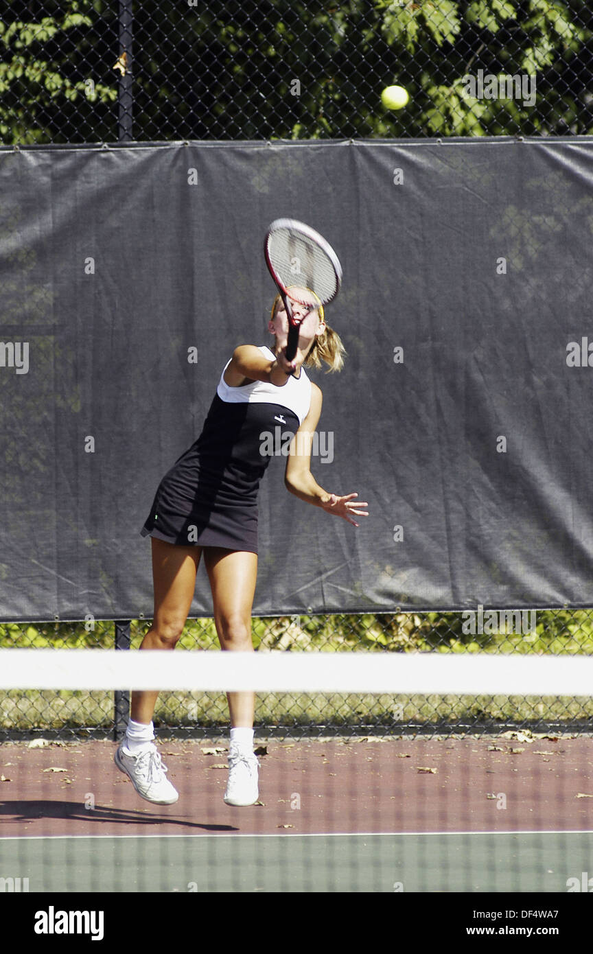Teenager Playing Tennis At School High Resolution Stock Photography and