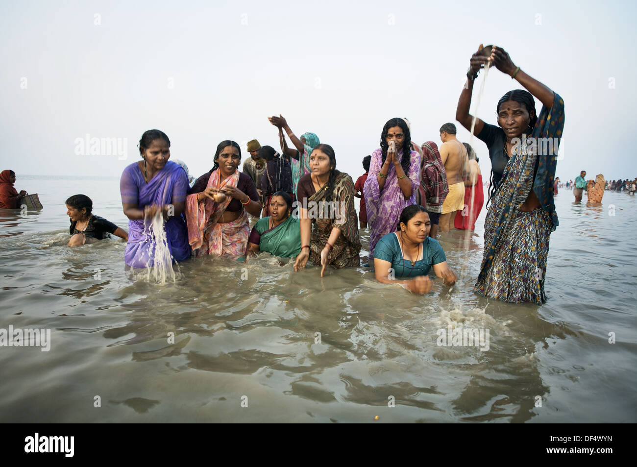 Pilgrims Bathing At The Confluence Of The River Ganges And The Bay Of ...