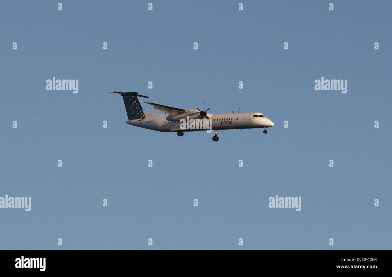 Porter airlines Bombardier Q400 aircraft coming in for a landing at Billy Bishop Airport on the Toronto Islands. Stock Photo