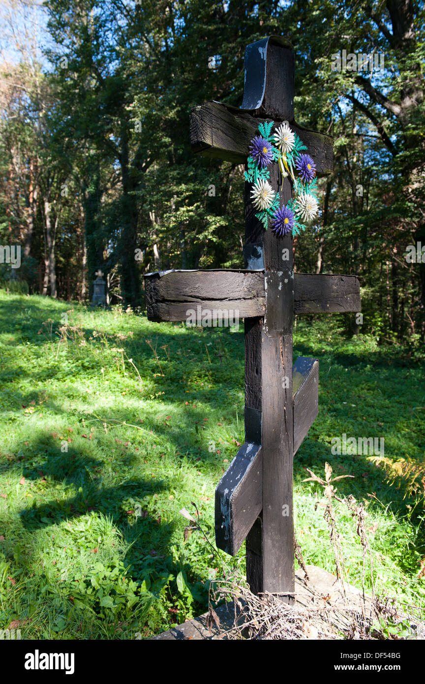 Wooden cross near Church of Ascension of our Lord, Ulucz, Gmina Dydnia, Brzozów County, Subcarpathian Voivodeship, Poland Stock Photo
