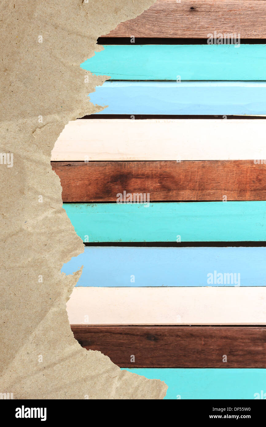 ripped paper on wooden background Stock Photo - Alamy