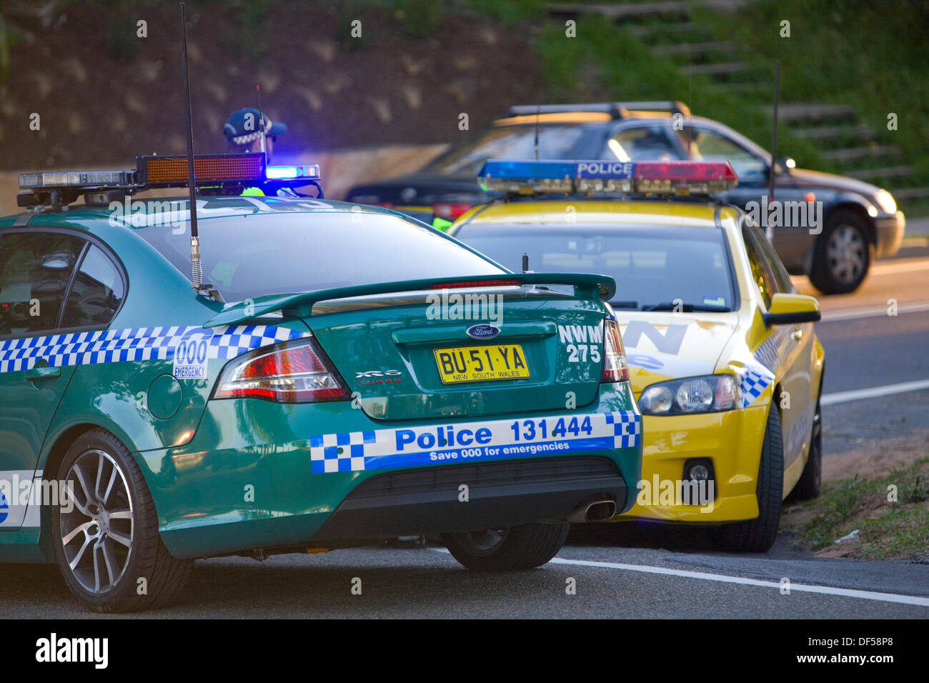 New South Wales police officers in a number of police cars attend an incident at Palm Beach in Sydney,NSW,Australia Stock Photo