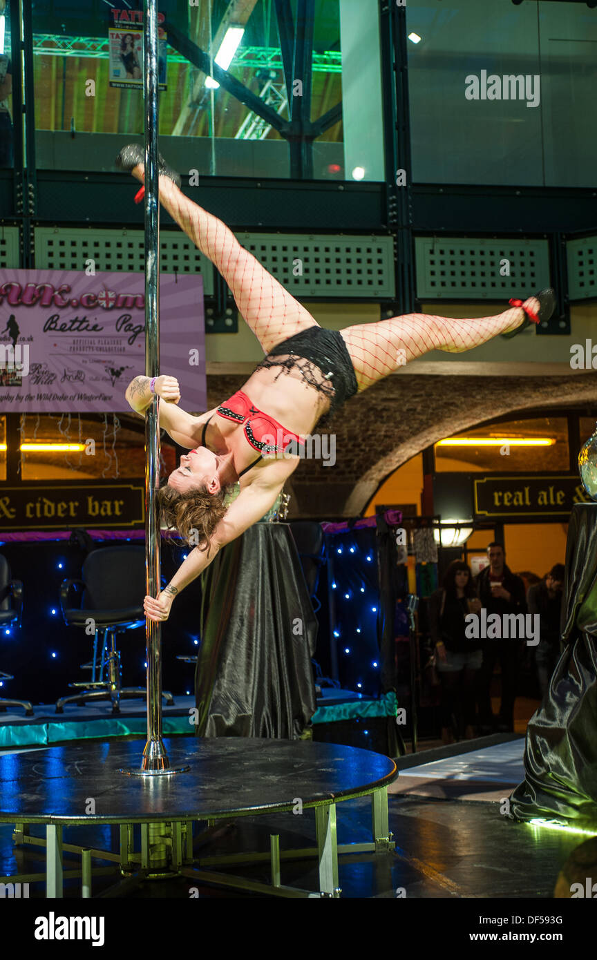 Burlesque artist  Millie Robson performing at the pin-up stage at the London Tattoo Convention. Stock Photo