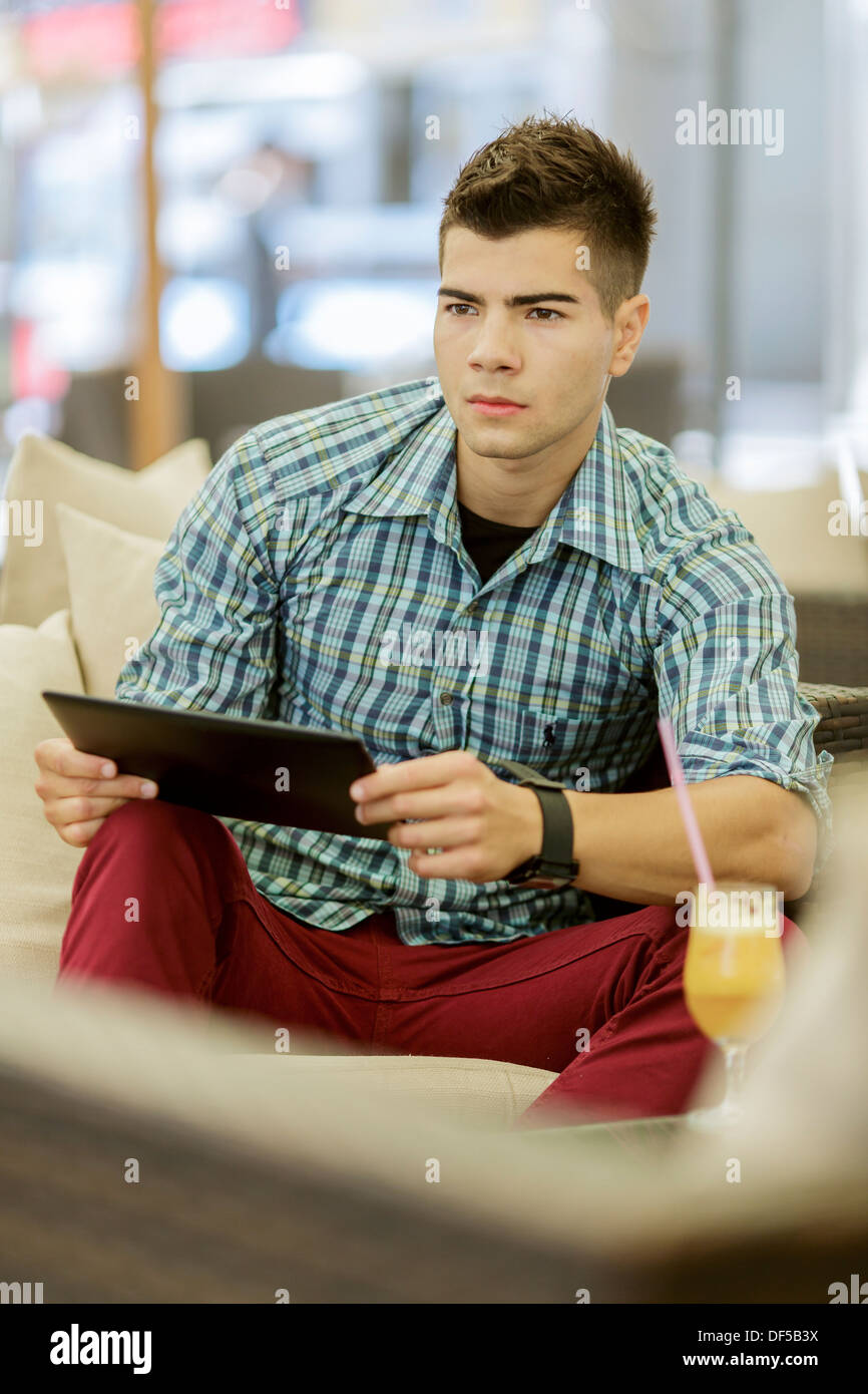 Young man with tablet Stock Photo