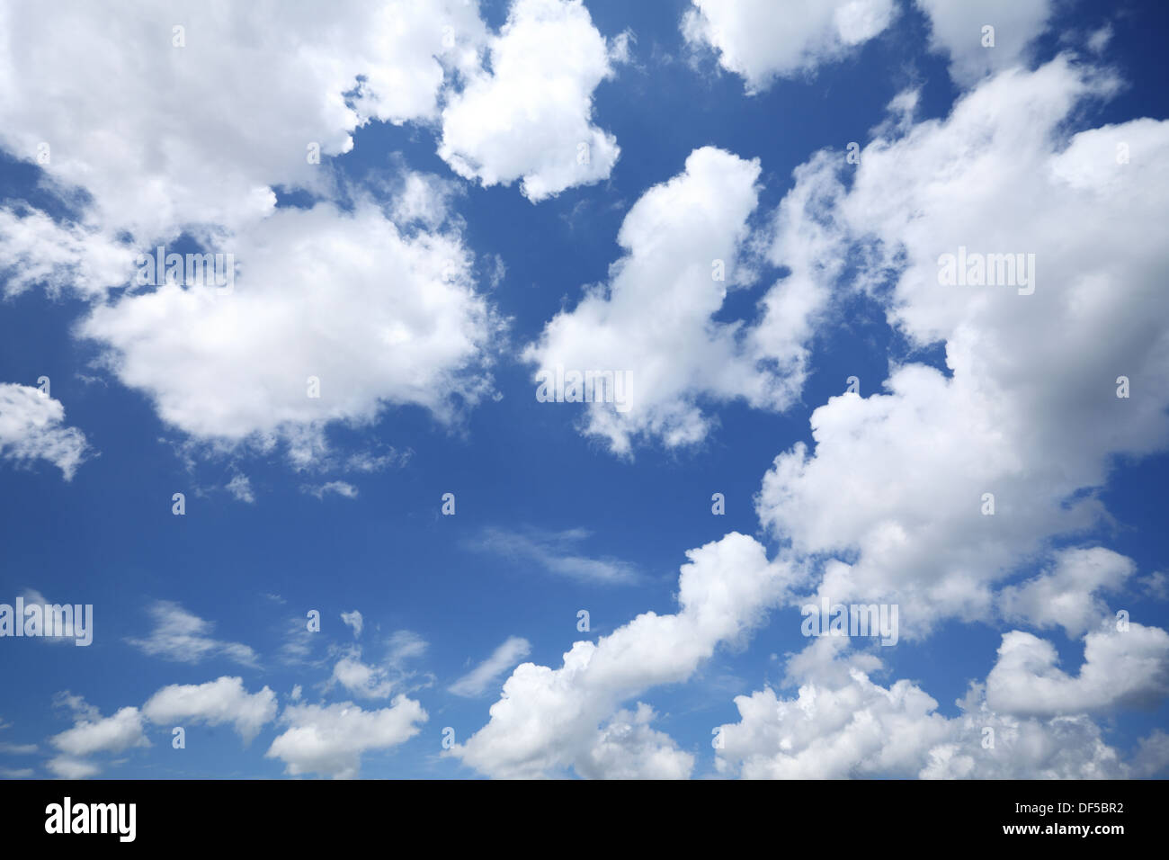 Deep blue sky background with white clouds Stock Photo - Alamy