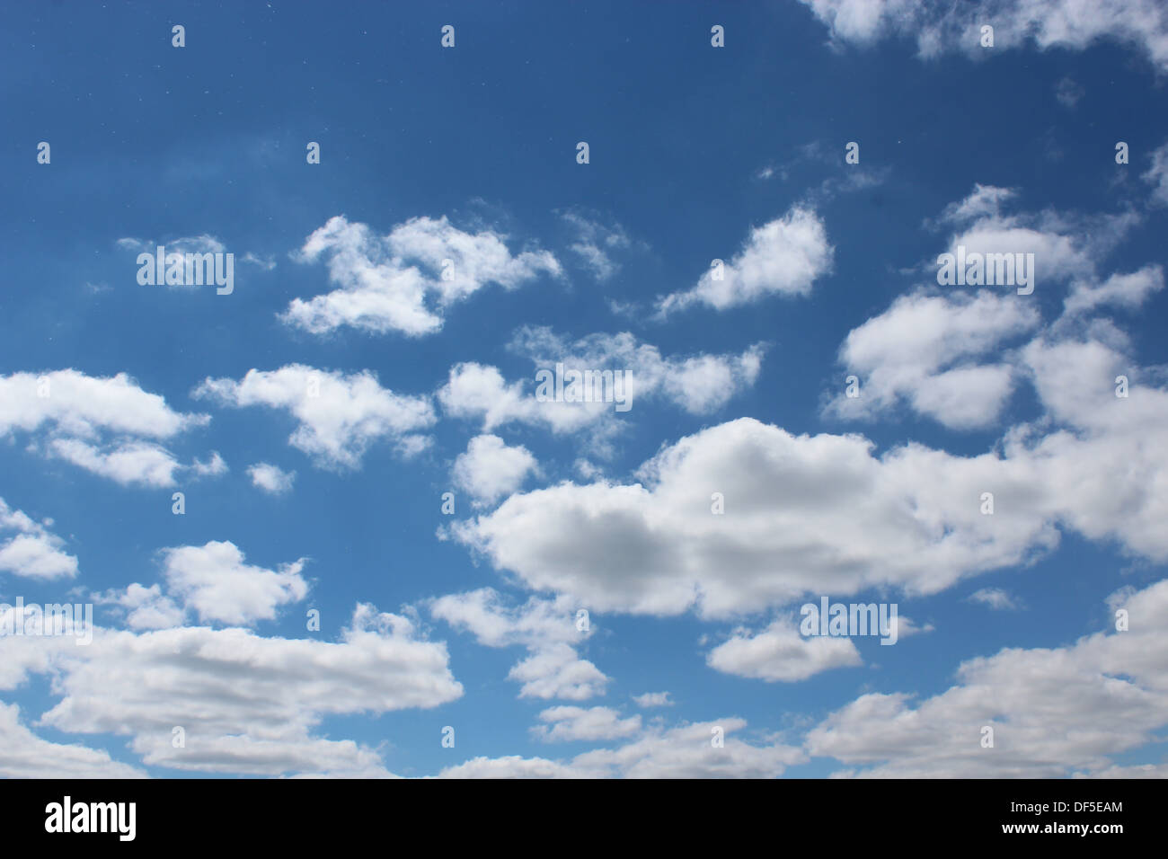 simple beautiful white clouds on blue sky background Stock Photo - Alamy
