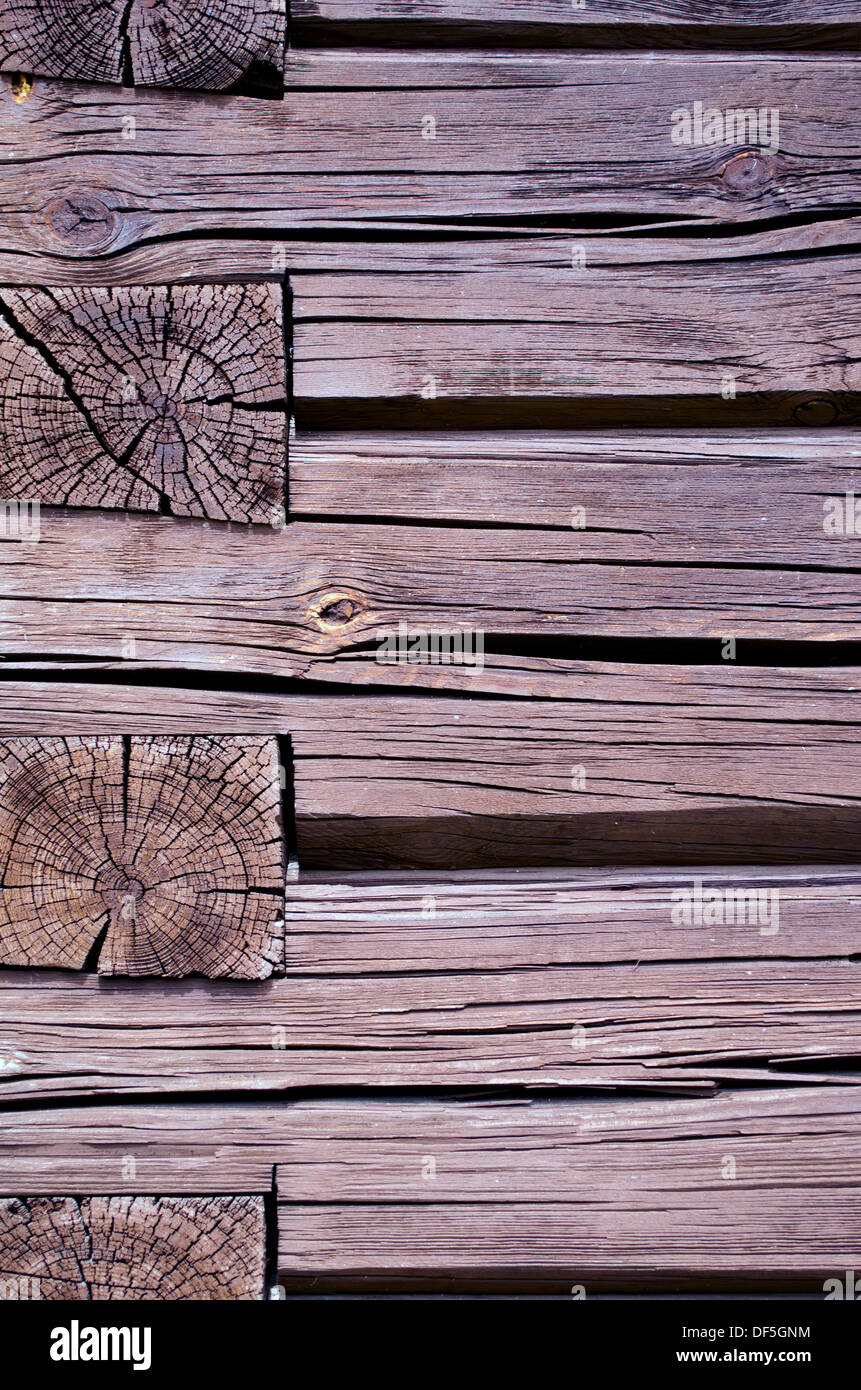old rural wooden house log wall construction background Stock Photo - Alamy