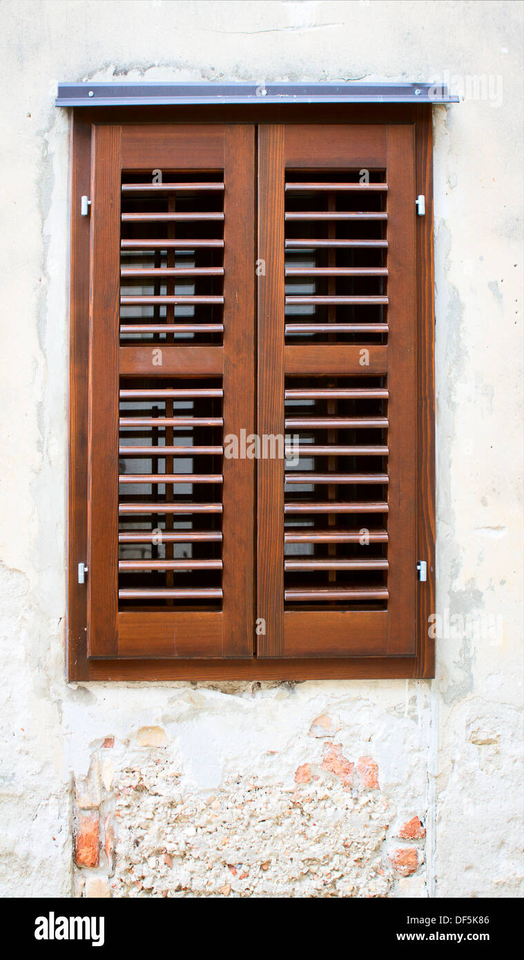 Old stone wall with wooden window Stock Photo - Alamy