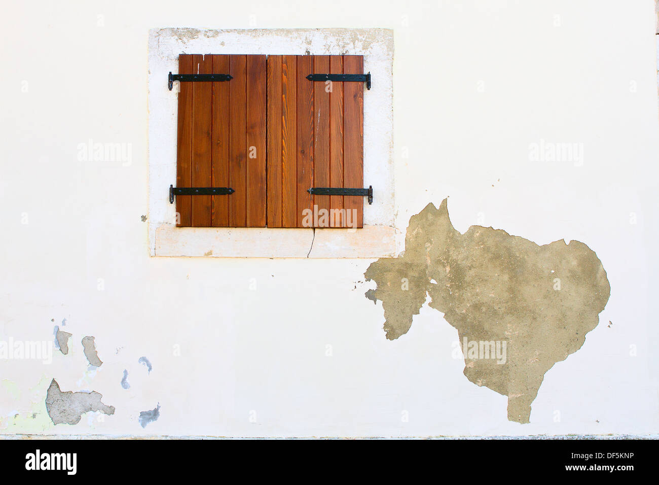 Old stone wall with wooden window Stock Photo - Alamy