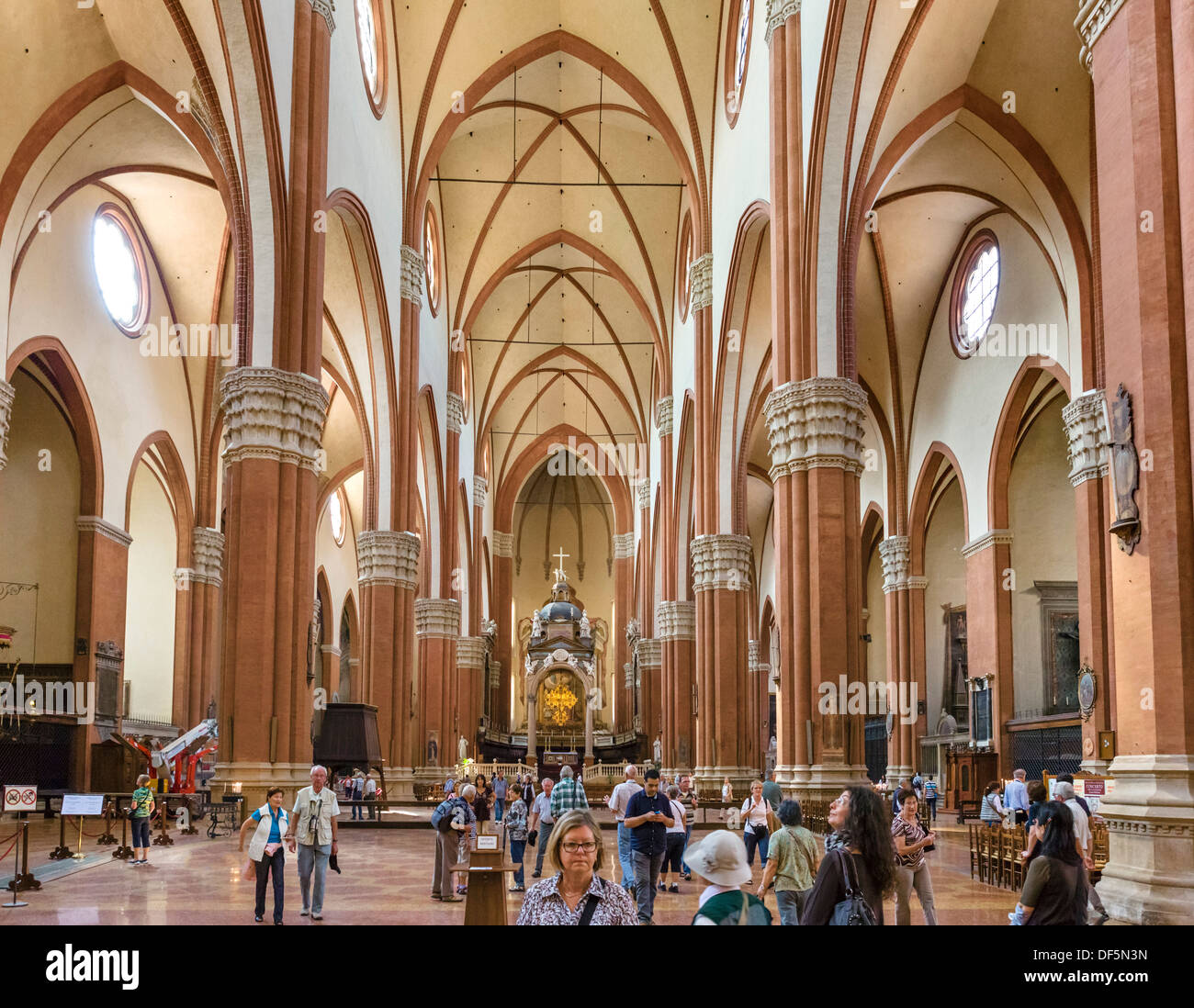 Tourists inside the Basilica of San Petronio, Bologna, Emilia Romagna, Italy Stock Photo