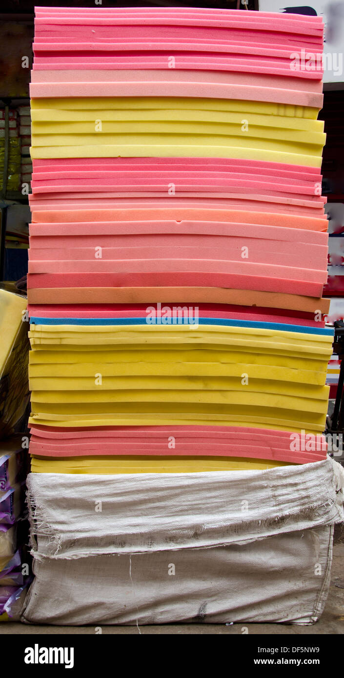 colorful foam rubber mattress in asian market, India Stock Photo