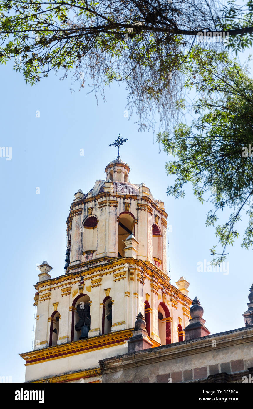 Spire of a church in Coyoacan neighborhood of Mexico City Stock Photo