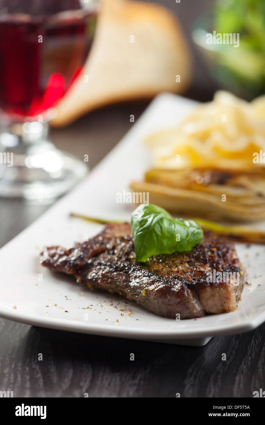 steak with basil and pasta Stock Photo Alamy
