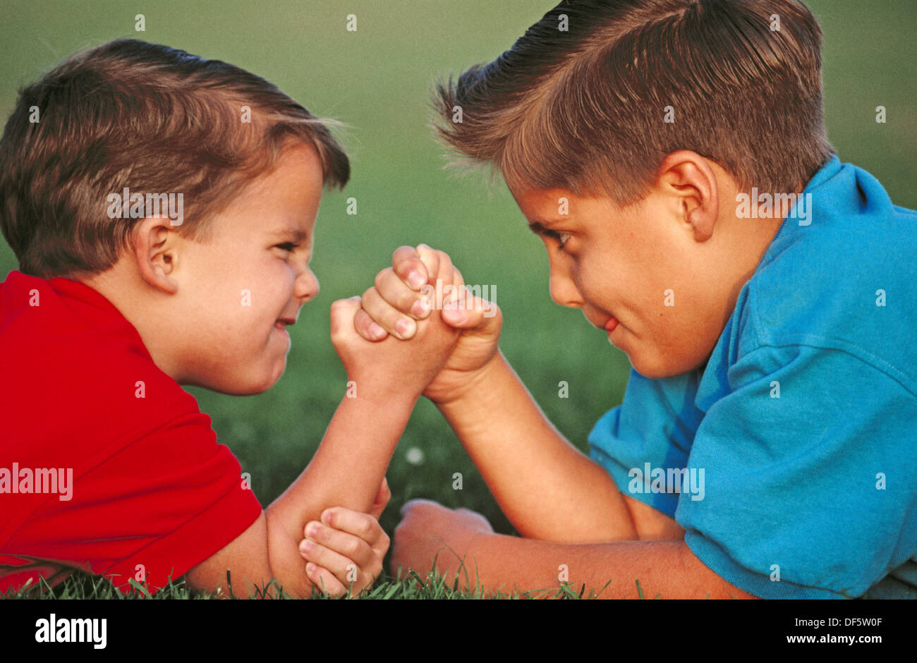 Boys arm wrestling Stock Photo Alamy