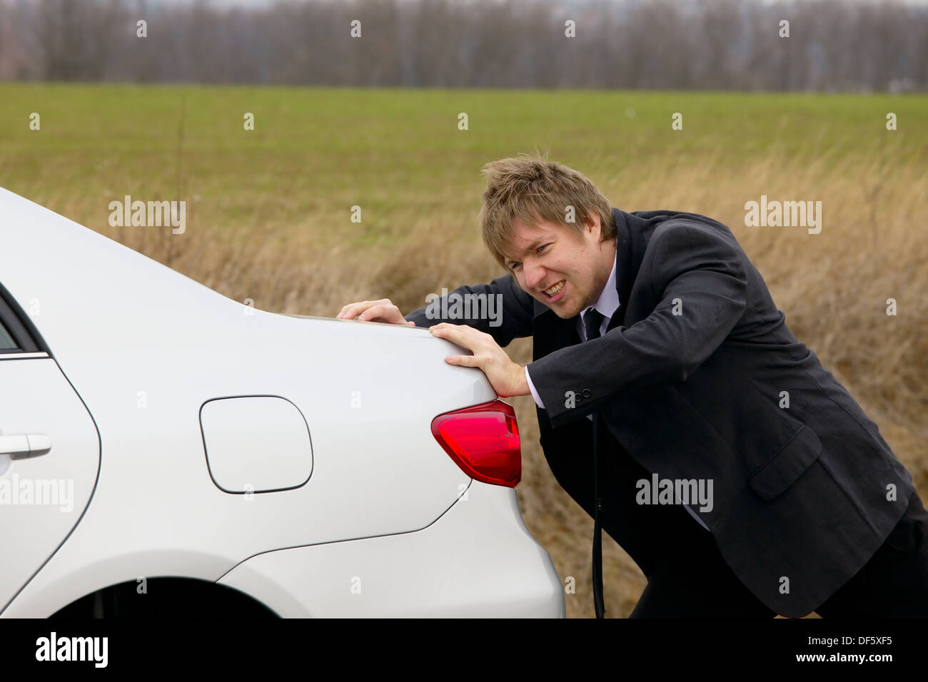 Pushing car Stock Photo