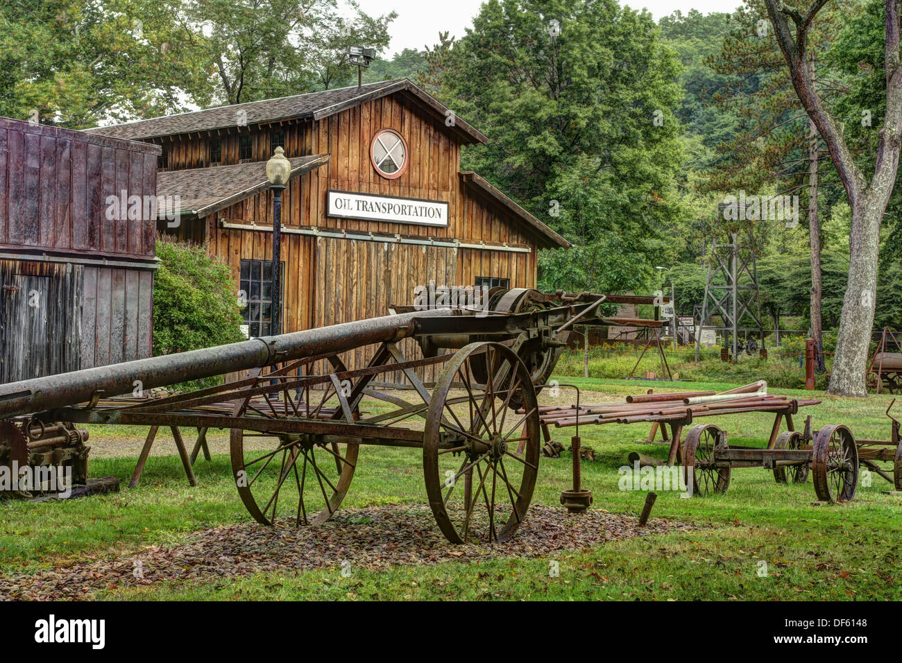 Oil drilling equipment in front of the Oil Transportation building. Drake Oil Well Museum. HDR Photo processing. Stock Photo