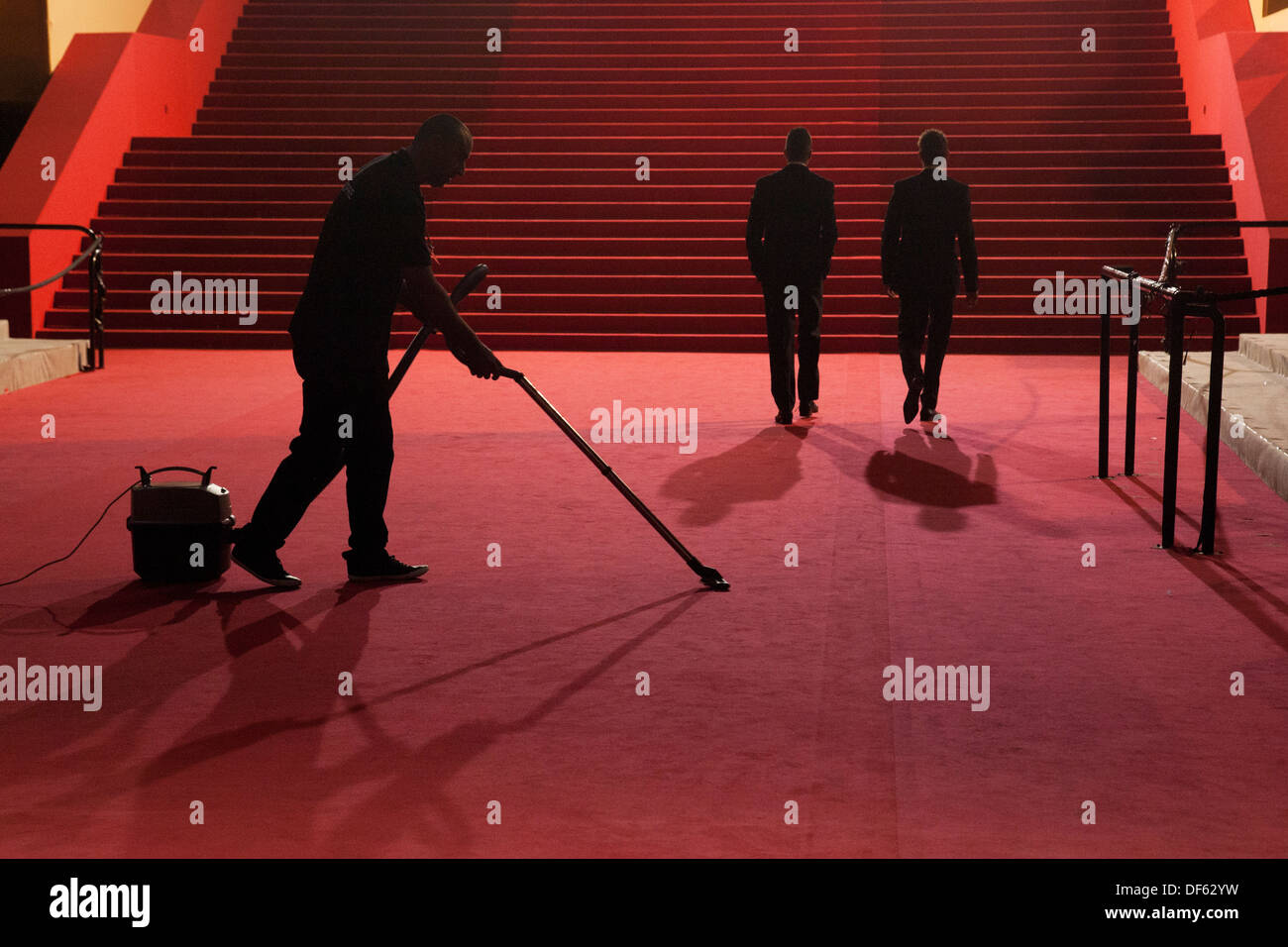 Red Carpet is cleaned at the end of the night at Cannes Film Festival Stock Photo