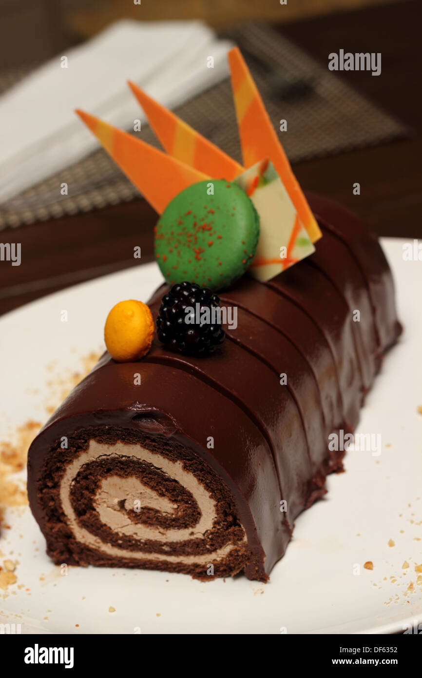 Christmas chocolate log cake with strawberry Stock Photo Alamy