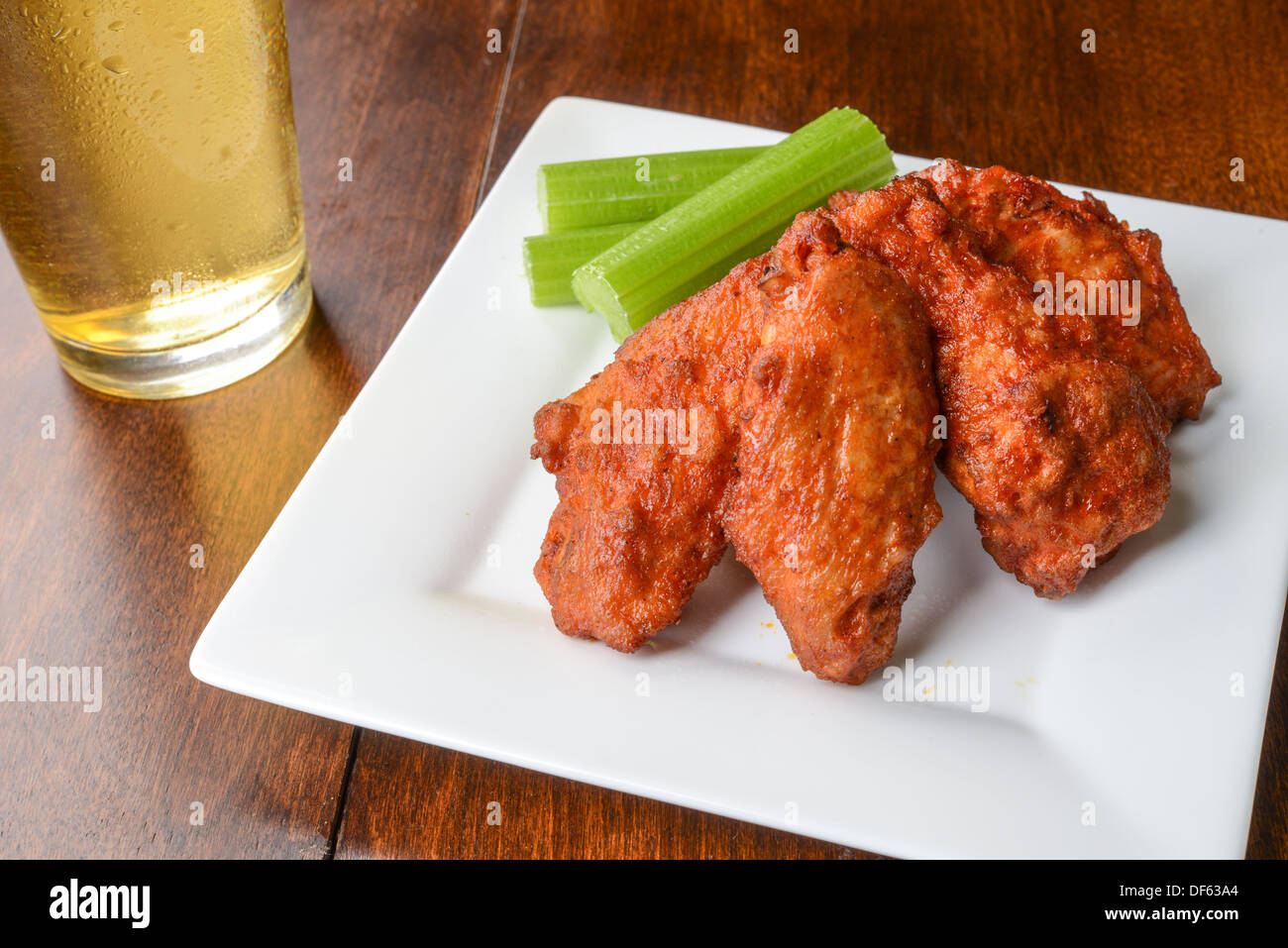 Chicken Buffalo Wings and a Beer Stock Photo Alamy
