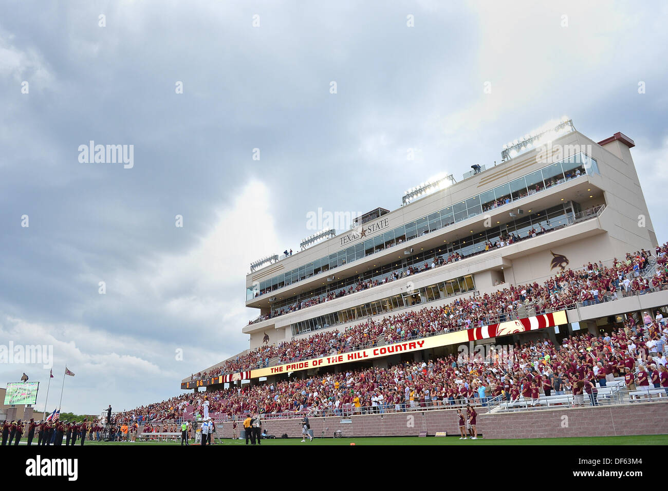 San Marcos, TX, USA. 28th Sep, 2013. View of press box during the singing of National Anthem before NCAA football kickoff game at Jim Wacker Field in San Marcos, TX. Texas State defeat Wyoming 42-21. © csm/Alamy Live News Stock Photo