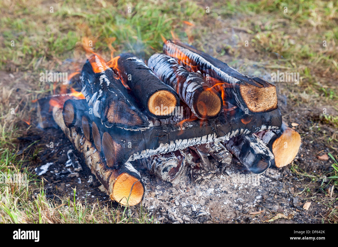 Closeup of a warm fire burning in a campfire Stock Photo
