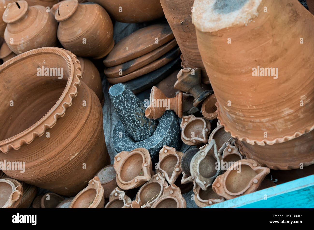 Hand thrown clay pots on a cart being sold at an indian market. Andhra Pradesh, India Stock Photo