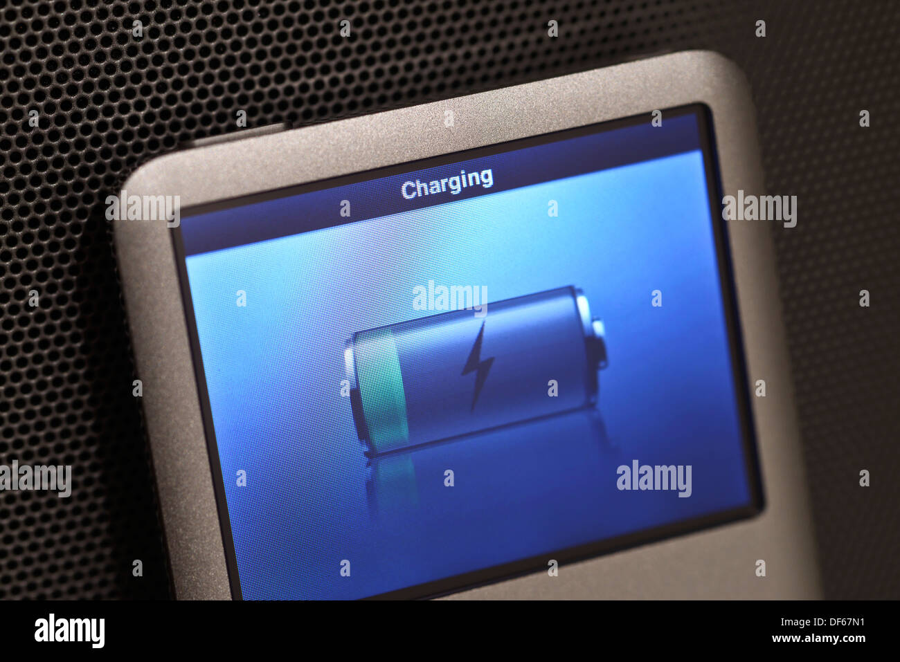 Empty Apple iPod battery being charged Stock Photo