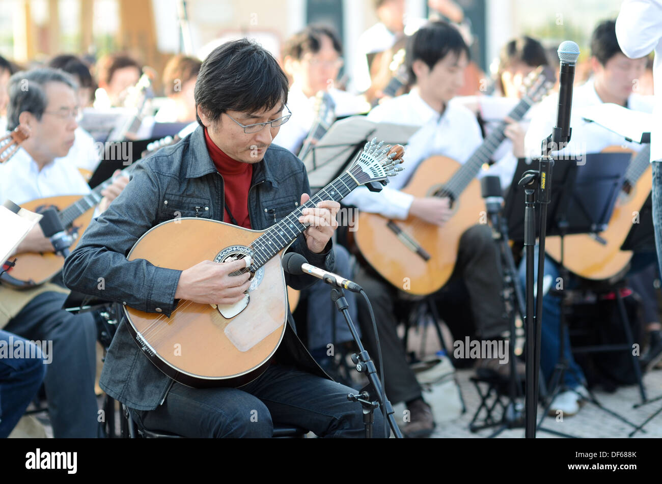 Takashi Yuasa, professional Portuguese-guitar and classical-guitar player. Stock Photo