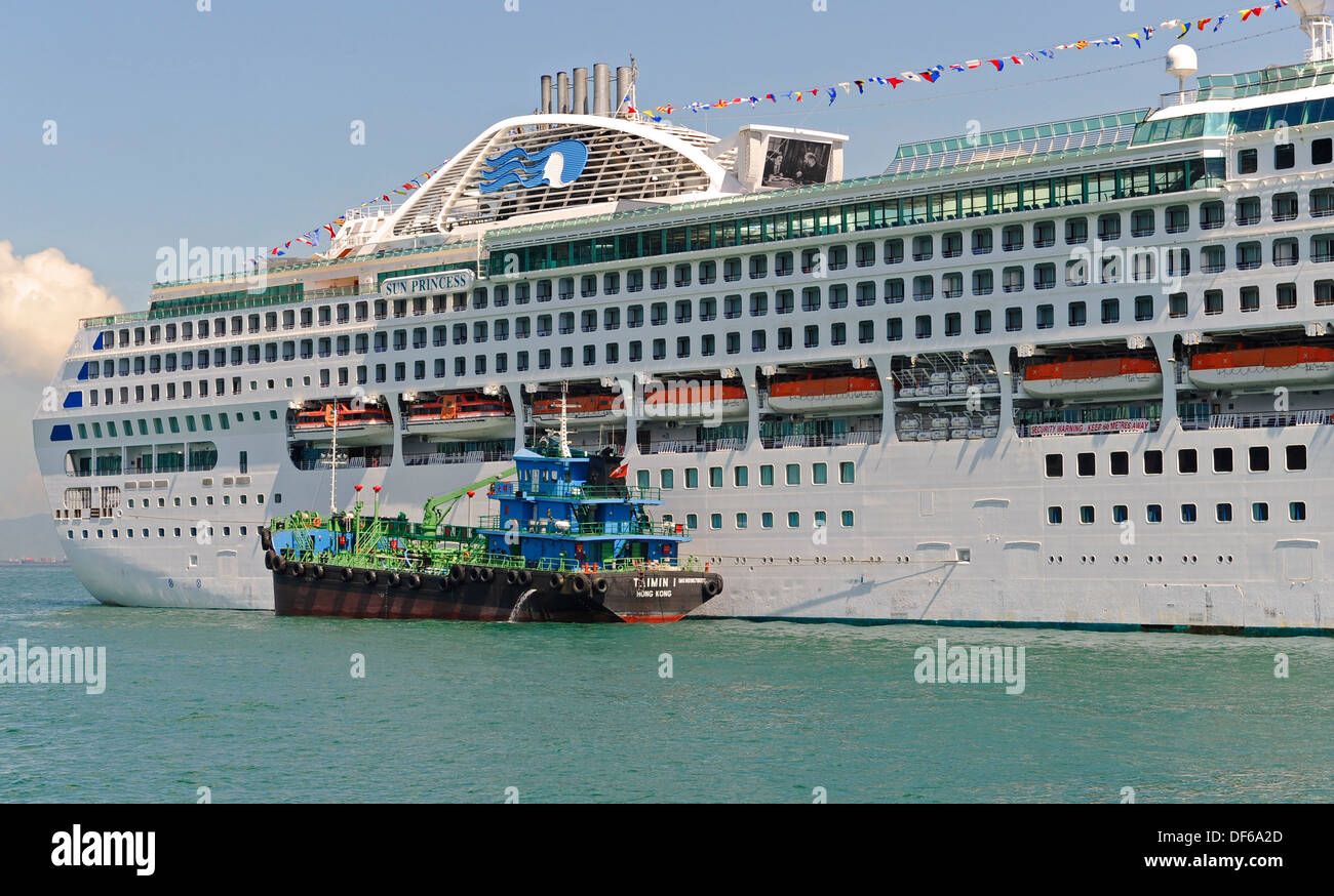 Refueling Vessel Along Side The Sun Princess Cruise Ship Stock Photo Alamy