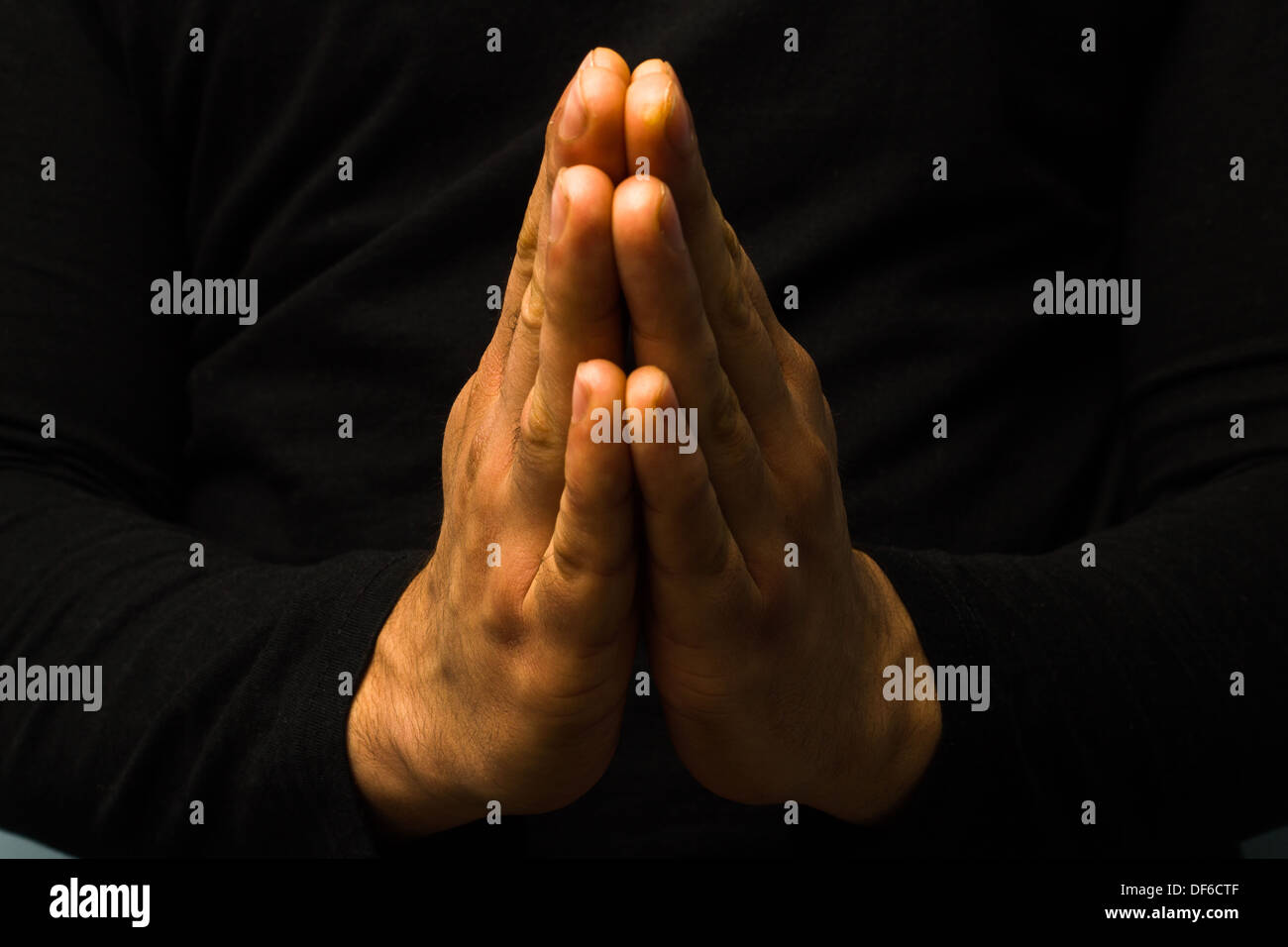 Praying hands hi-res stock photography and images - Alamy