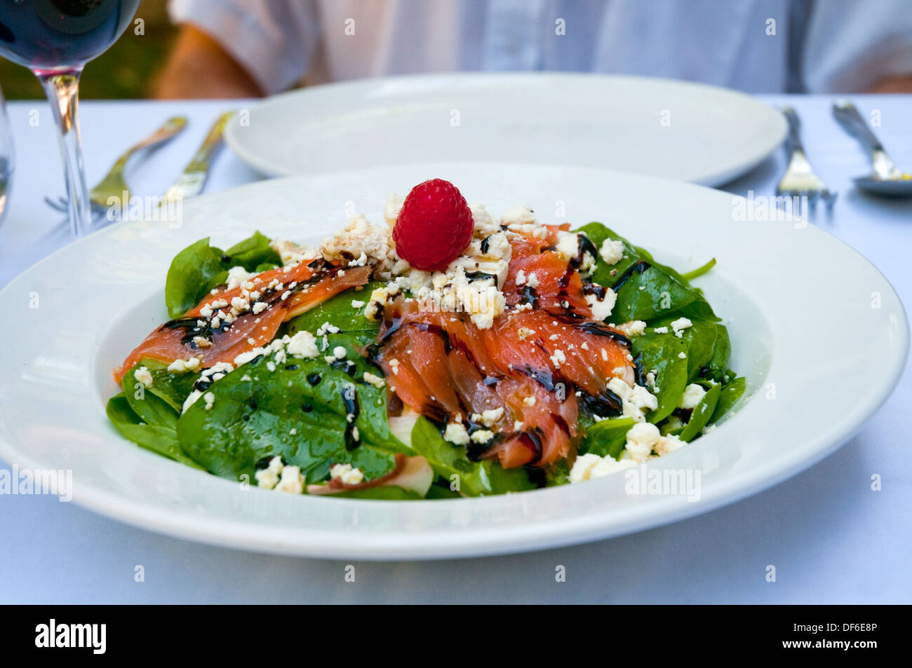Salad made of lettuce, smoked salmon and cottage cheese. Stock Photo