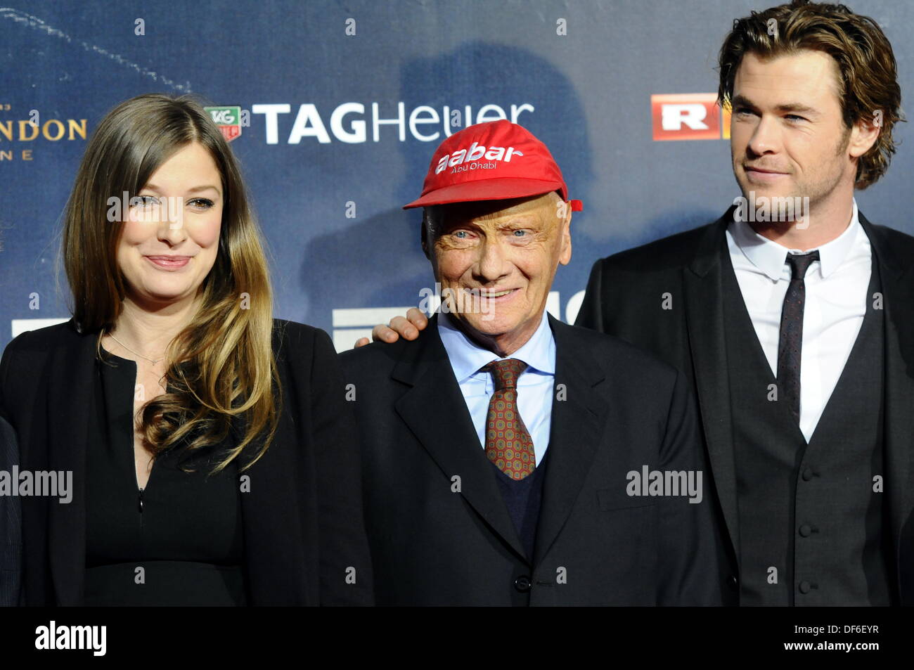 Cologne, Germany. 28th Sep, 2013. Alexandra Maria Lara, Niki Lauda and  Chris Hemsworth (R) arrive for the German premiere of the movie 'Rush' in  Cologne, Germany, 28 September 2013. The movie opens