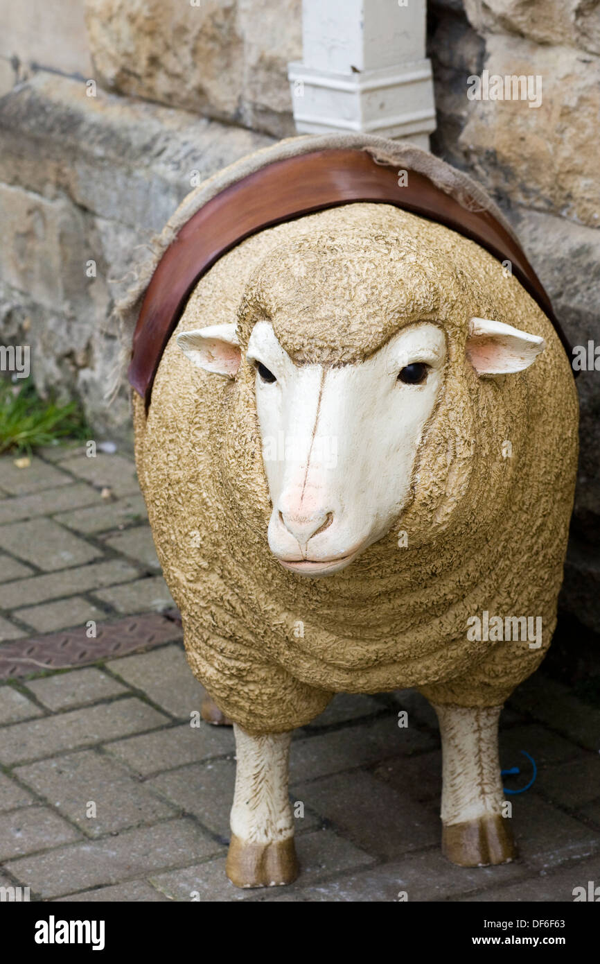 Life size Model of a Sheep stood on a pavement in Chipping Campden