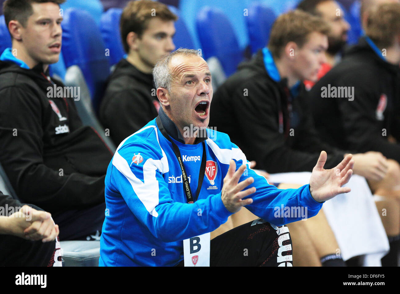 Kiel, Germany. 29th Sep, 2013. Copenhagen's head coach Bilan Suman during the handball Champions League group B match between THW Kiel ands KIF Kolding Copenhagen at Sparkassenarena in Kiel, Germany, 29 September 2013. Photo: CHRISTIAN CHARISIUS/dpa/Alamy Live News Stock Photo