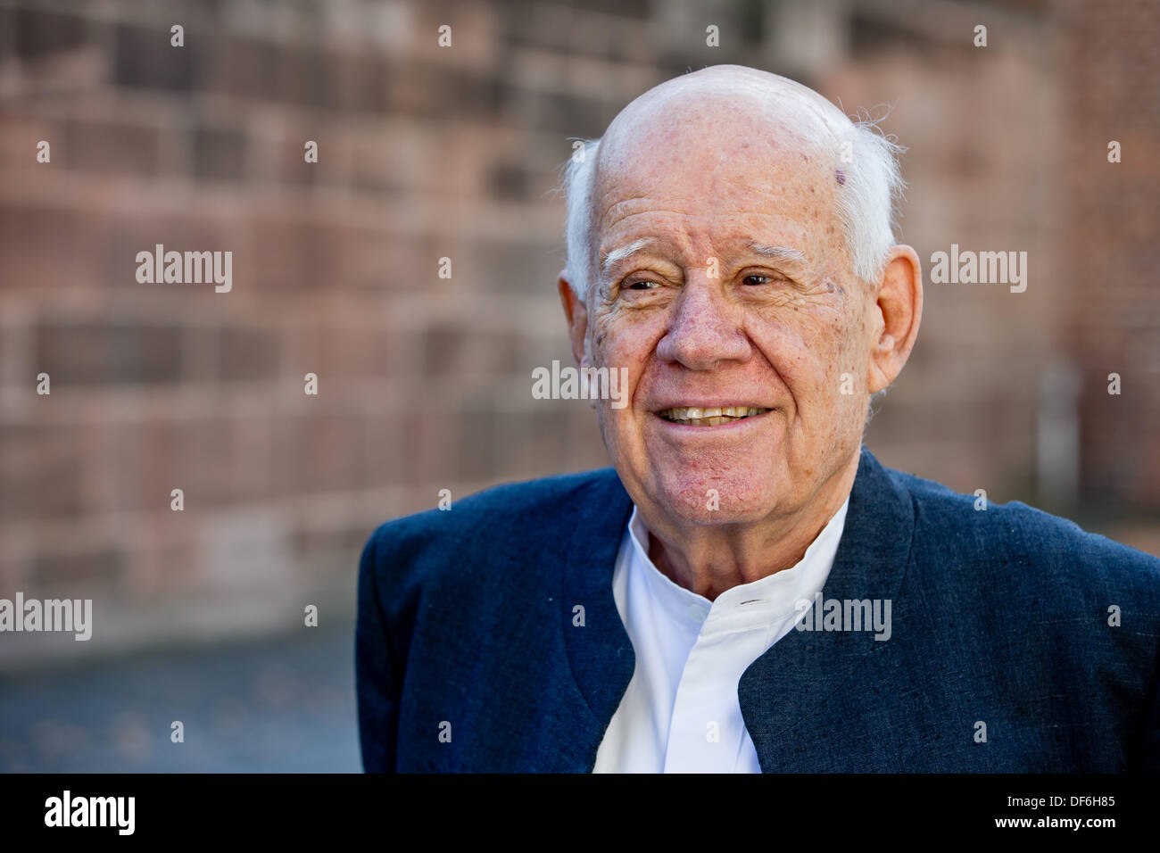 Nuremberg, Germany. 29th Sep, 2013. Israeli sculptor Dani Karavan in Nuremberg, Germany, 29 September 2013. He is known for his site specific monuments lik the Heinrich-Boell-Platz in Cologne of the "Street of Human Rights". Photo: DANIEL KARMANN/dpa/Alamy Live News Stock Photo
