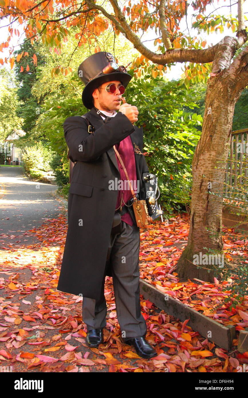 Derbyshire, UK. 29 Sept 2013. Chris Simpson poses for photographs during the second annual Steampunk Illuminati event in Matlock Bath, a Victorian spa town in Derbyshire.  The steampunk sub-culture emerged from a genre of science-fiction literature and has come to develop its own music and pseudo-Victorian fashion styles. Credit:  Matthew Taylor/Alamy Live News Stock Photo