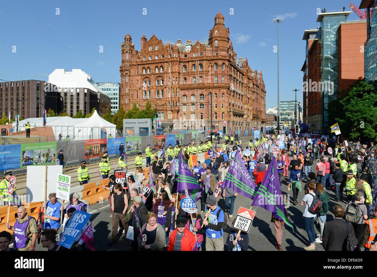Manchester, UK. 29th Sept 2013. A view of Lower Mosley Street including the Midland Hotel during a North West TUC organised march and rally intending to defend National Health Service (NHS) jobs and services from cuts and privatisation. The march coincides with the Conservative Party Conference 2013 being held in the city. Credit:  Russell Hart/Alamy Live News. Stock Photo