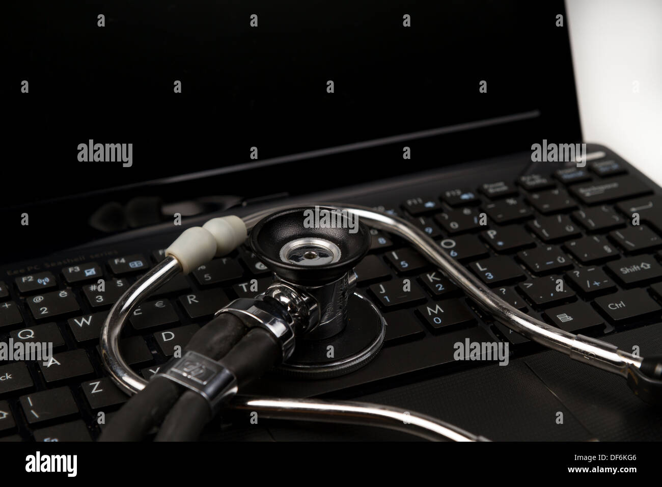 Stethoscope on computer netbook Stock Photo - Alamy