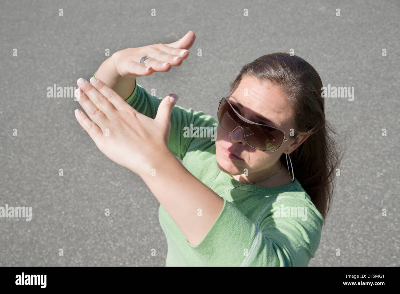 Hand blocking sun hires stock photography and images Alamy