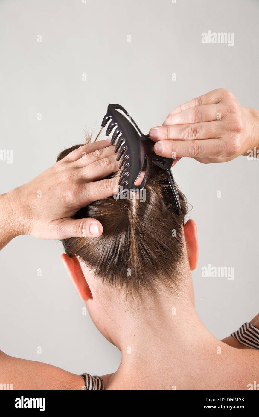 Hand fix fixing adjust adjusting hair hi-res stock photography and images - Alamy Hand fix fixing adjust adjusting hair hi-res stock photography and images - Alamy