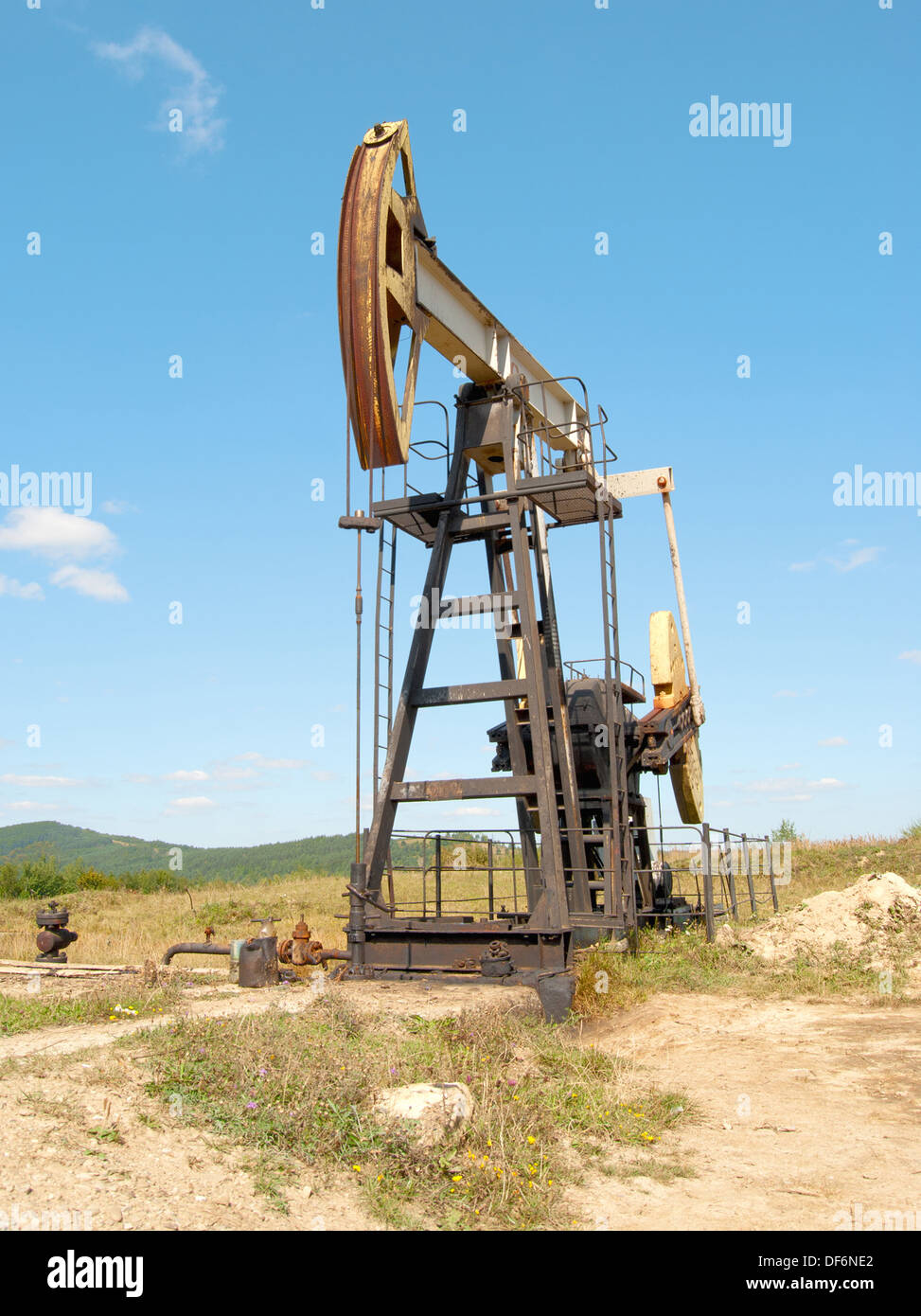 work of oil pump jack on a oil field Stock Photo Alamy