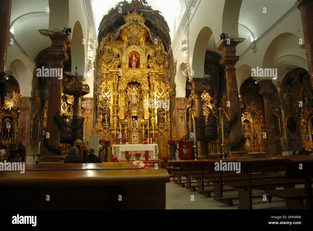 Main altarpiece of the Iglesia de San Nicolas de Bari. La Judería. Seville,  Andalucia, Spain, Europe Stock Photo - Alamy
